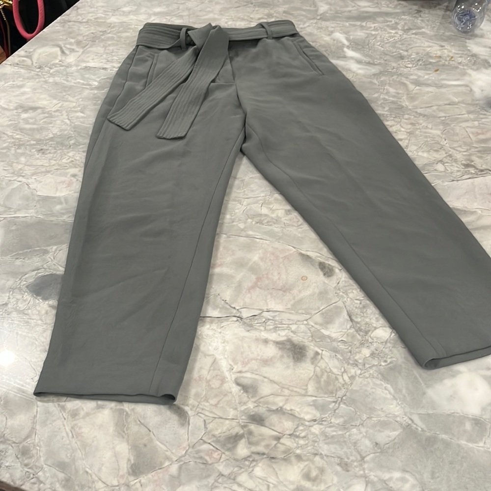 Sage green cropped tie waist pants from Aritzia